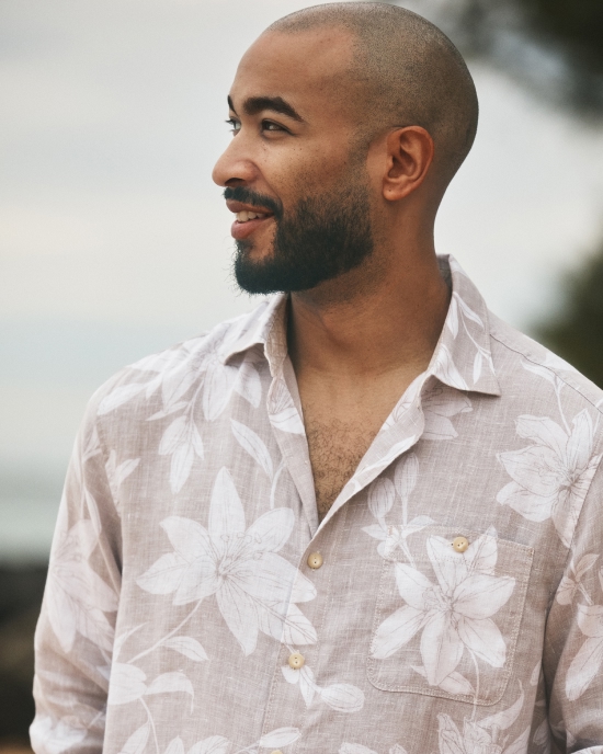 Man in a light floral shirt
