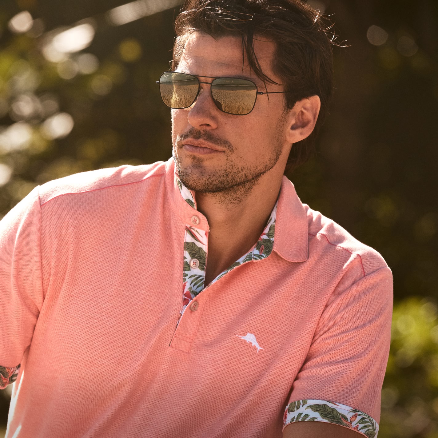 Image of man wearing Tommy Bahama Polo