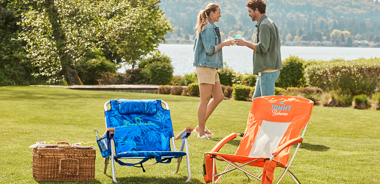 Friends Enjoying A Fall Picnic With Tommy Bahama Beach Chairs