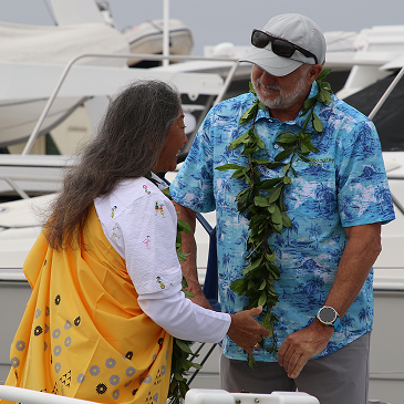 Roy Greeting A Guest At The Docks