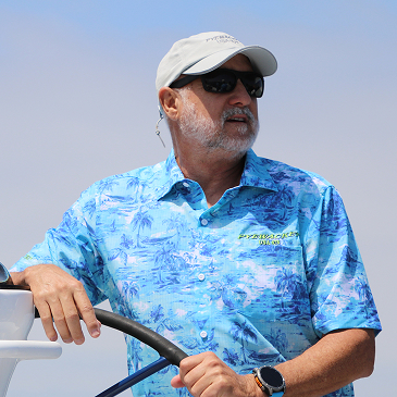 Roy At The Stern of His Boat