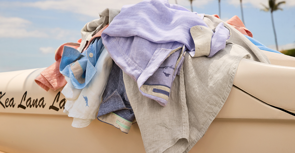 Pile of linen Tommy Bahama shirts