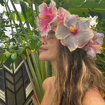 Pamakane Pico Wearing A Hibiscus Lei