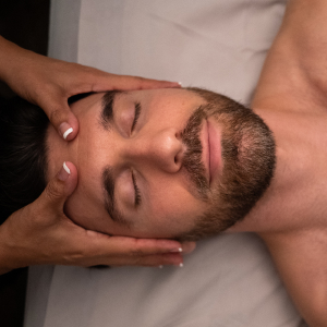 Person getting a face massage